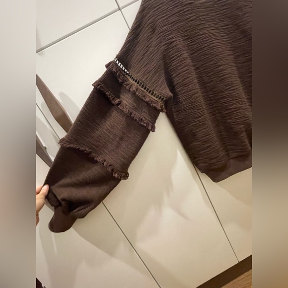 Relaxed round neck pullover sweater with full and decorative sleeves. - Picture 3 of 4